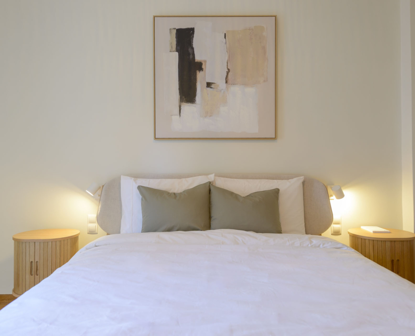Bedroom with 160 cm double bed, high quality mattress and allergy-friendly bedding in furnished long stay apartment in Ano Petralona, Athens